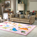 Living room with a brown sofa, dinosaur rug, and children's books.