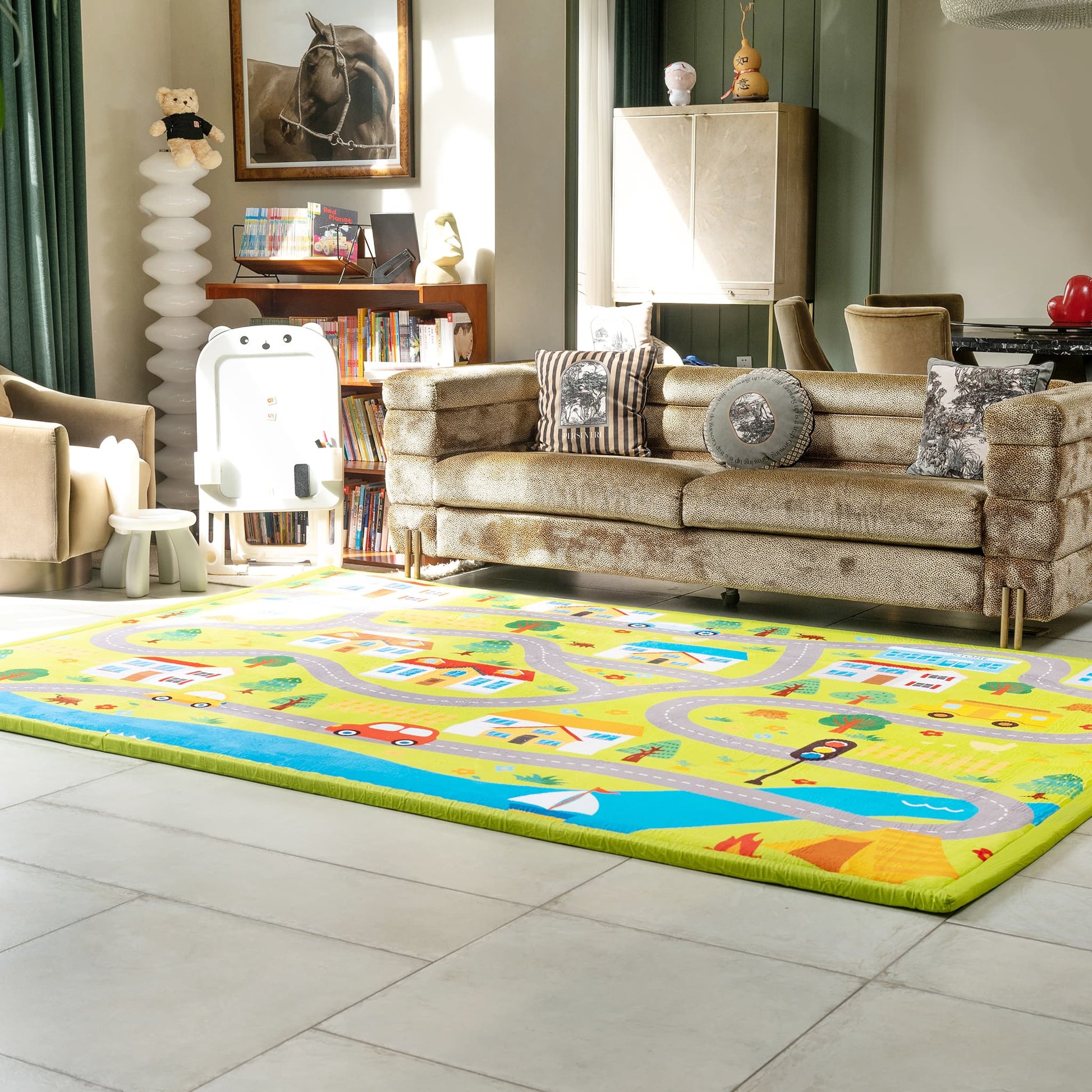 Living room with a colorful children's rug featuring roads and vehicles on a tiled floor.