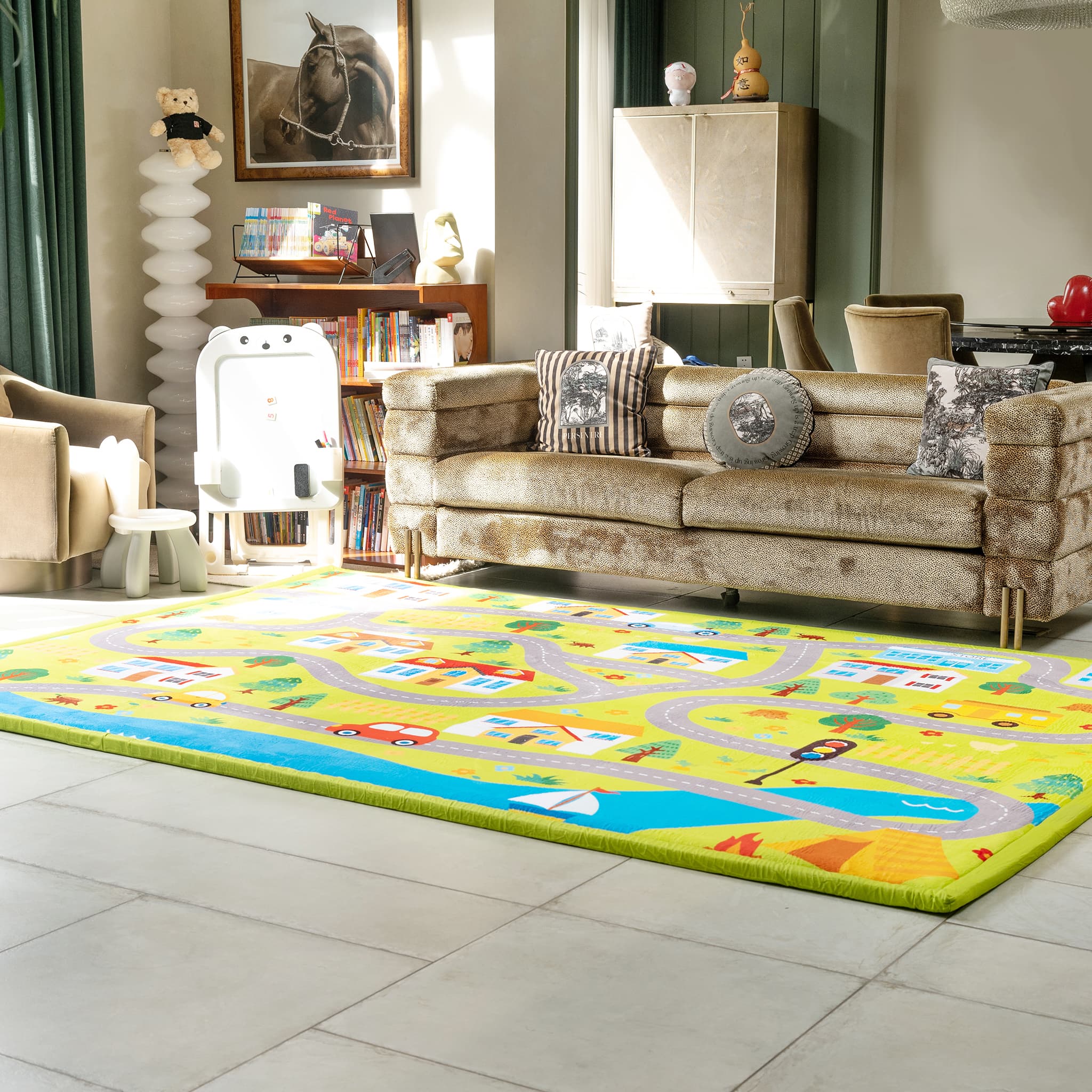 Living room with a colorful children's rug featuring roads and vehicles on a tiled floor.