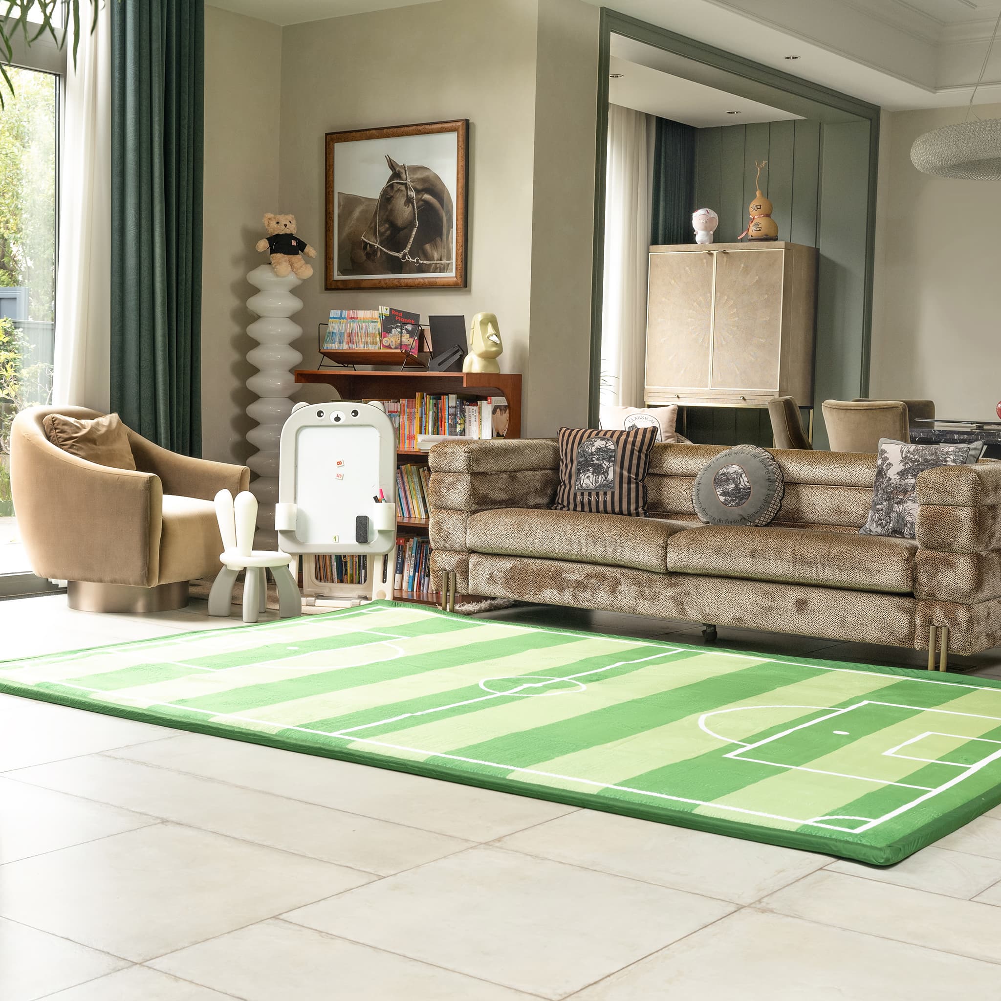 Living room with a LuxKing Cloud Mat of Classic Soccer Field design with beige sofa, and decorative items around it