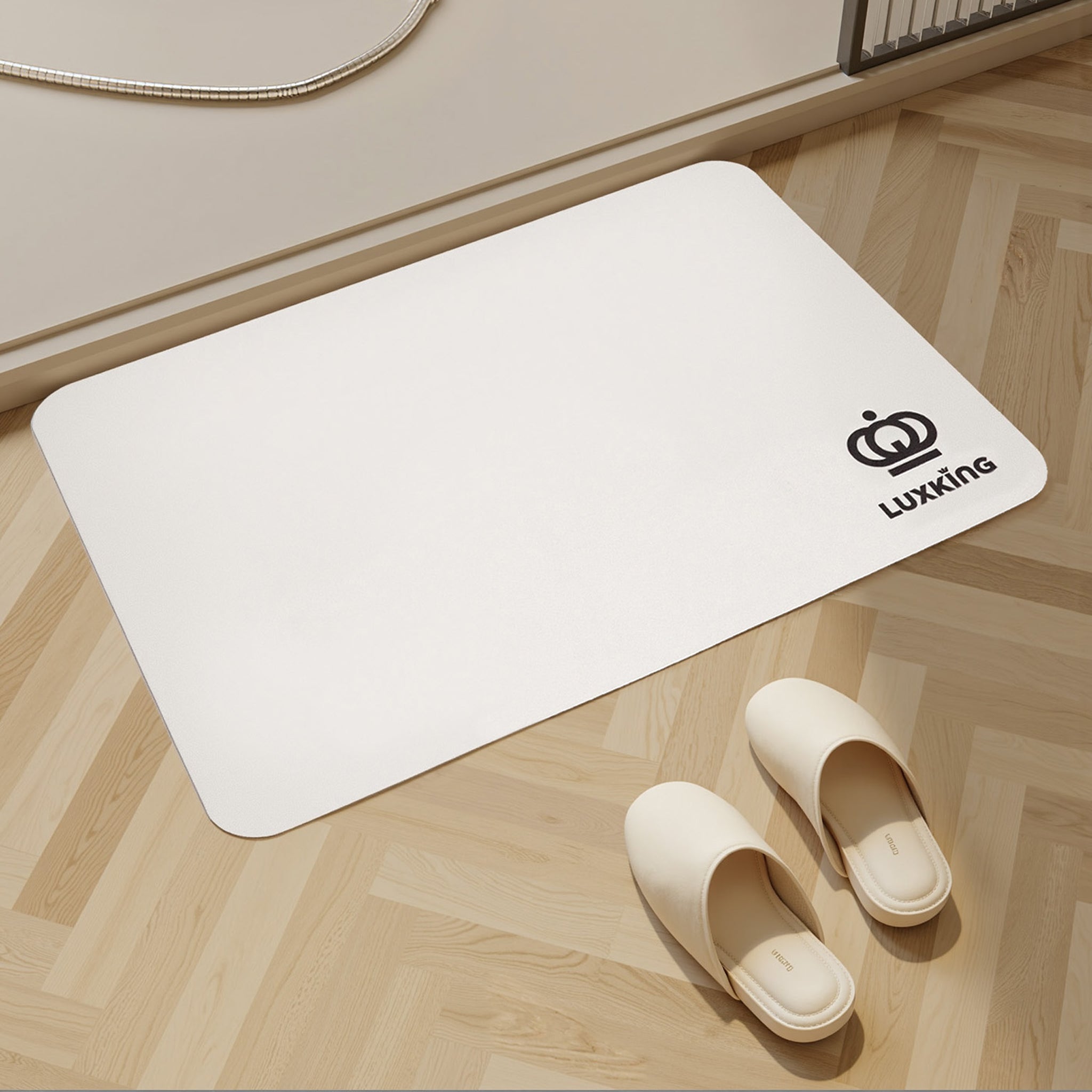 White mat with Luxking logo on a wooden floor with white slippers.