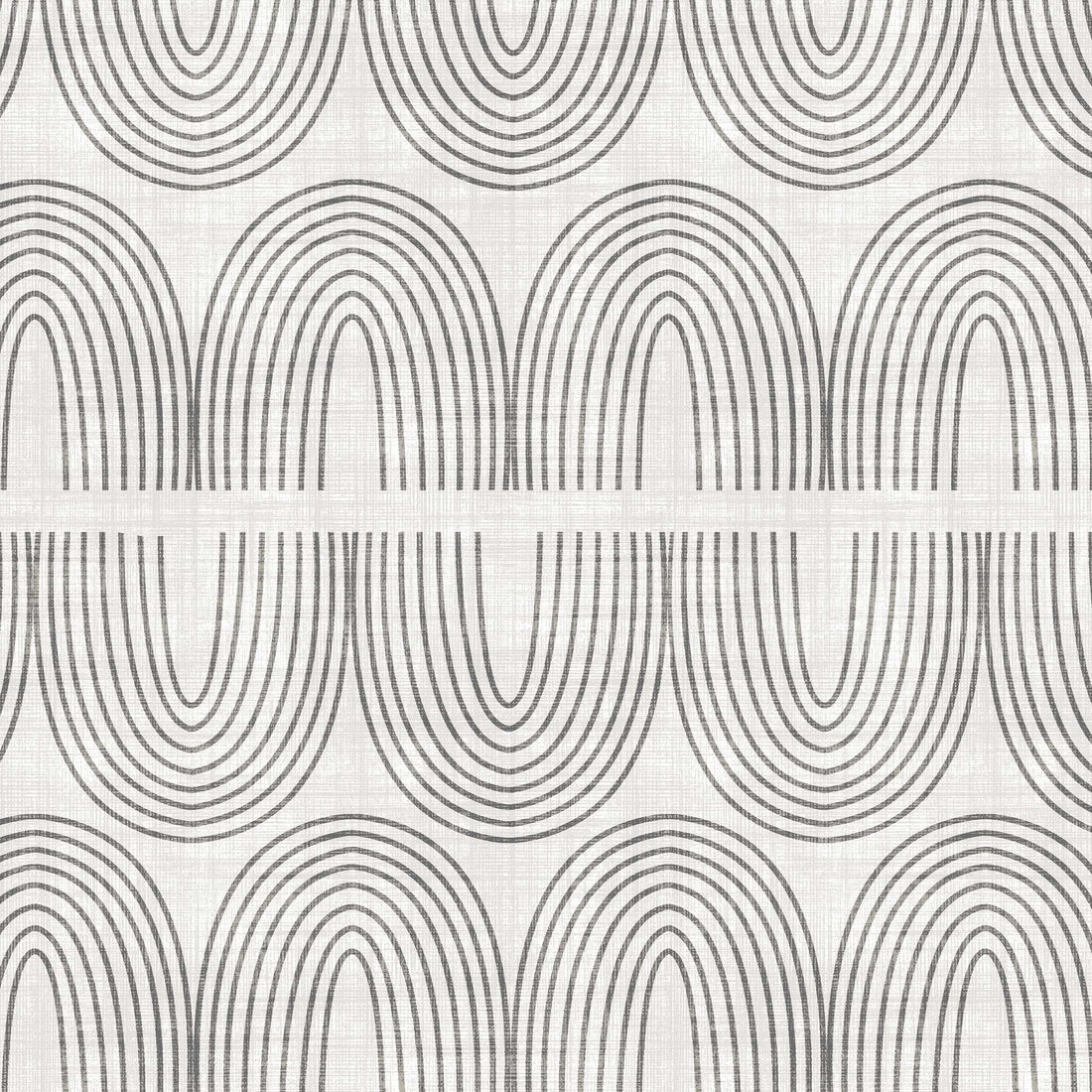 Living room with a patterned rug on the floor, sofa, and baby chair.