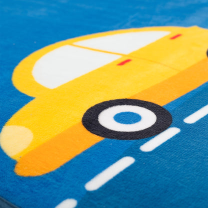 Yellow toy car on a blue road surface