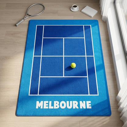 Blue tennis court rug with 'Melbourne' text on a wooden floor.