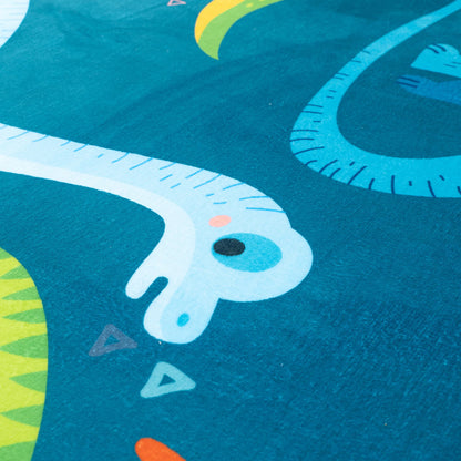 Close-up of a colorful snake design on a blue background