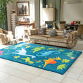 Children's room with a dinosaur rug on a tiled floor, featuring a sofa and decorative items.