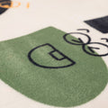 Close-up of a green logo on a white background