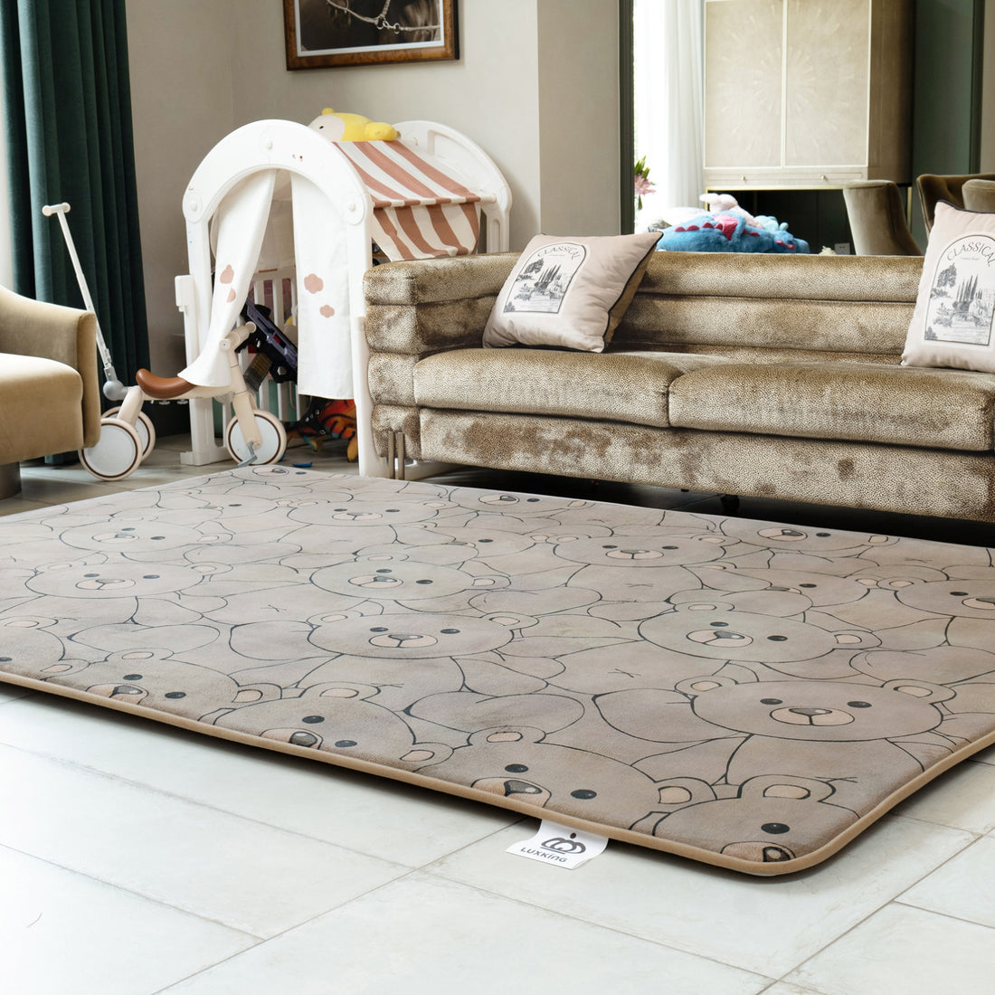 Living room with a teddy bear patterned rug and a brown sofa.