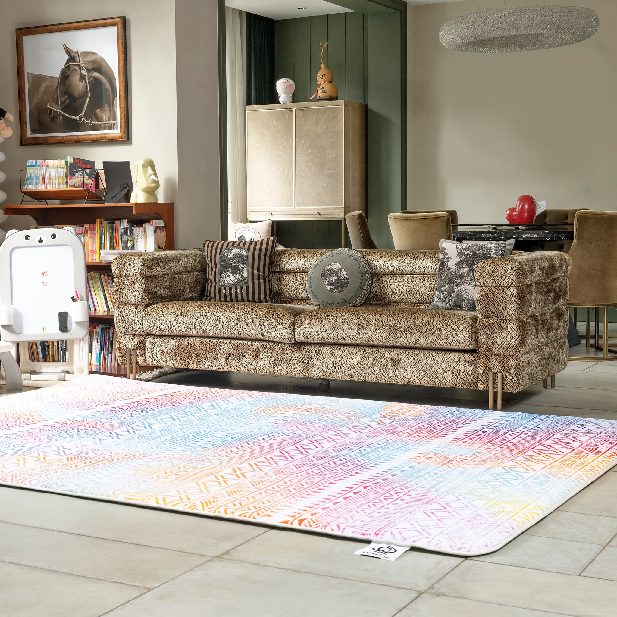 Living room with a brown sofa, colorful rug, and decorative items.