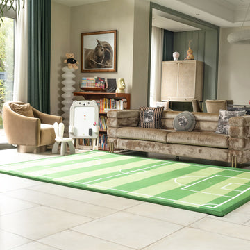 Living room with a LuxKing Cloud Mat of Classic Soccer Field design with  beige sofa, and decorative items around it