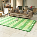 Living room with a soccer field rug and beige sofa