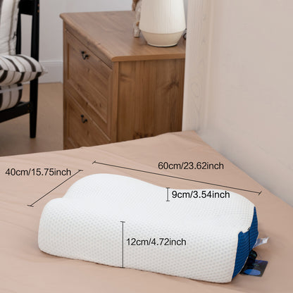 Measurement chart of a white pillow on a bed with wooden furniture in the background